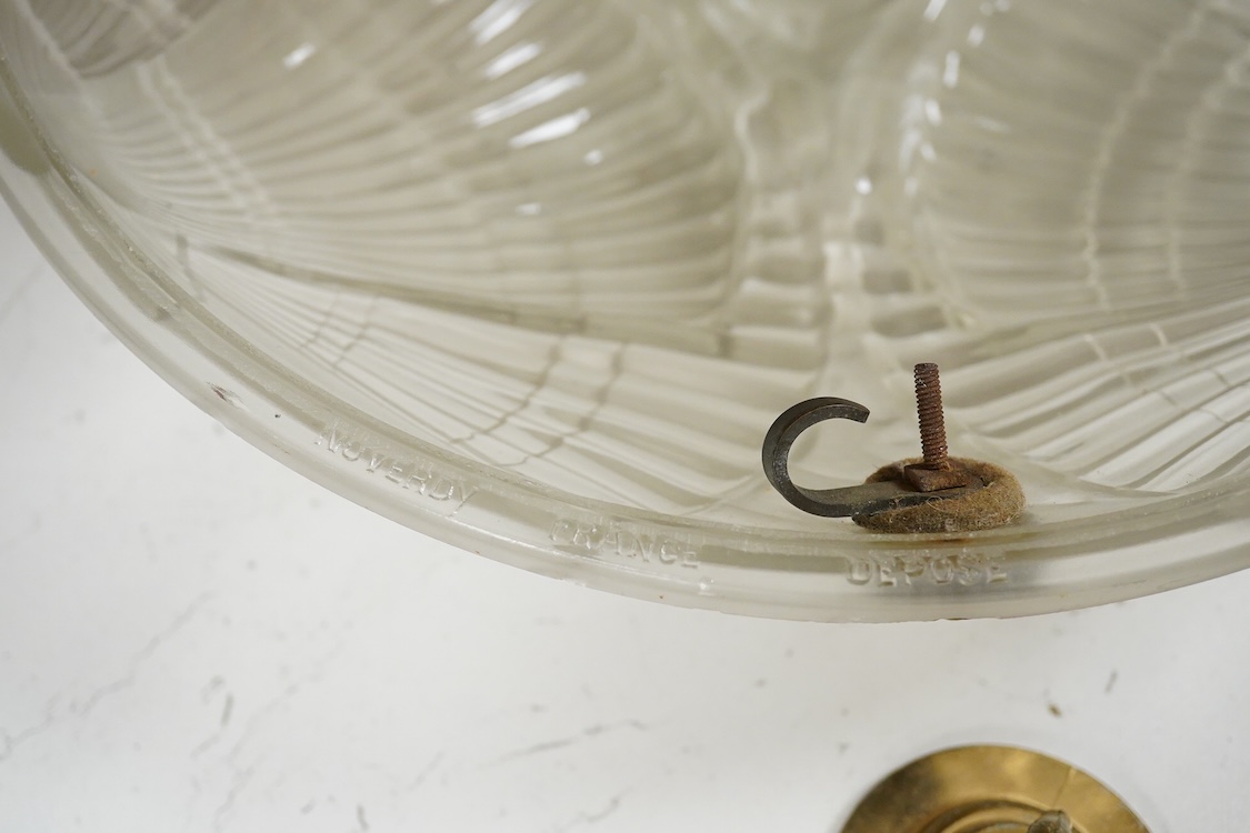 A Noverdy French pressed glass plafonniere of shell design, 34cm in diameter